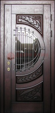 Одностворчатая входная дверь со стеклом и ковкой ДСК-21 в Троицке